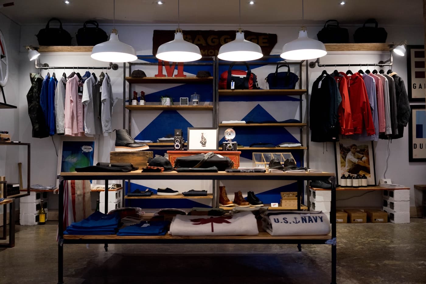 A considered retail interior with ordered shelving and warm material finishes.